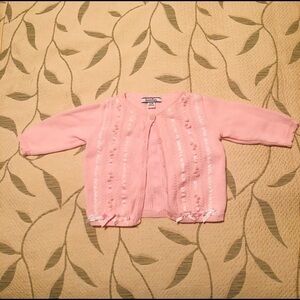 Pink button down sweater from Hartstrings